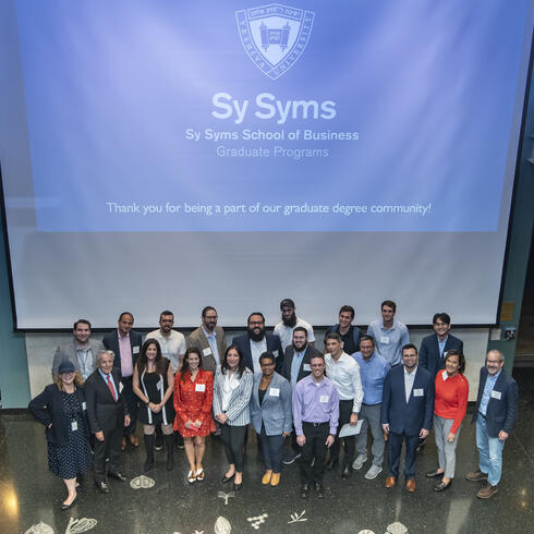 group shot of Sy Syms grad students at the inaugural Sy Syms Graduate Programs Community Night of Networking in September 2024